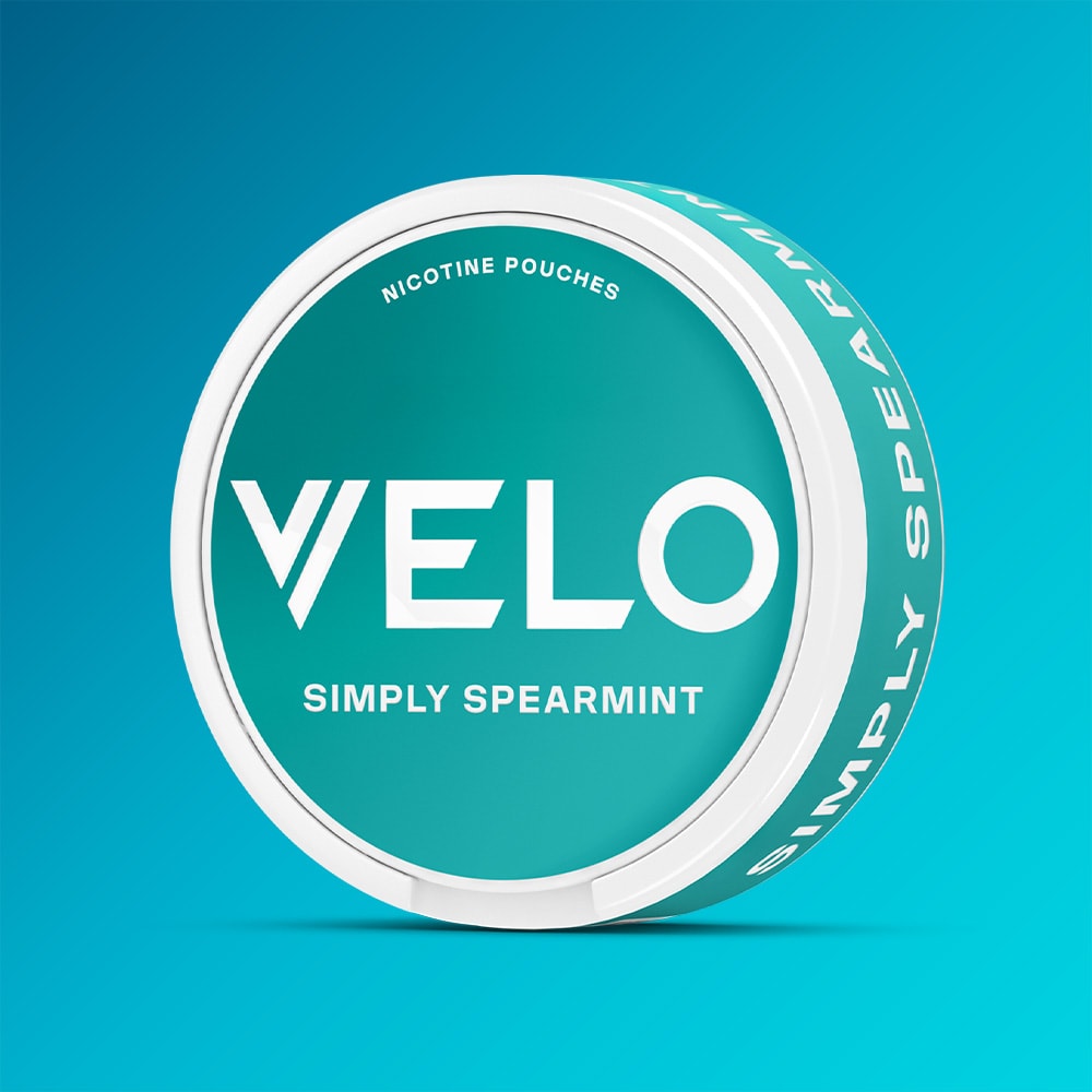 Round container of VELO Simply Spearmint nicotine pouches in teal and white packaging.
